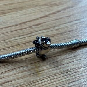 Authentic Pandora skiing penguin charm